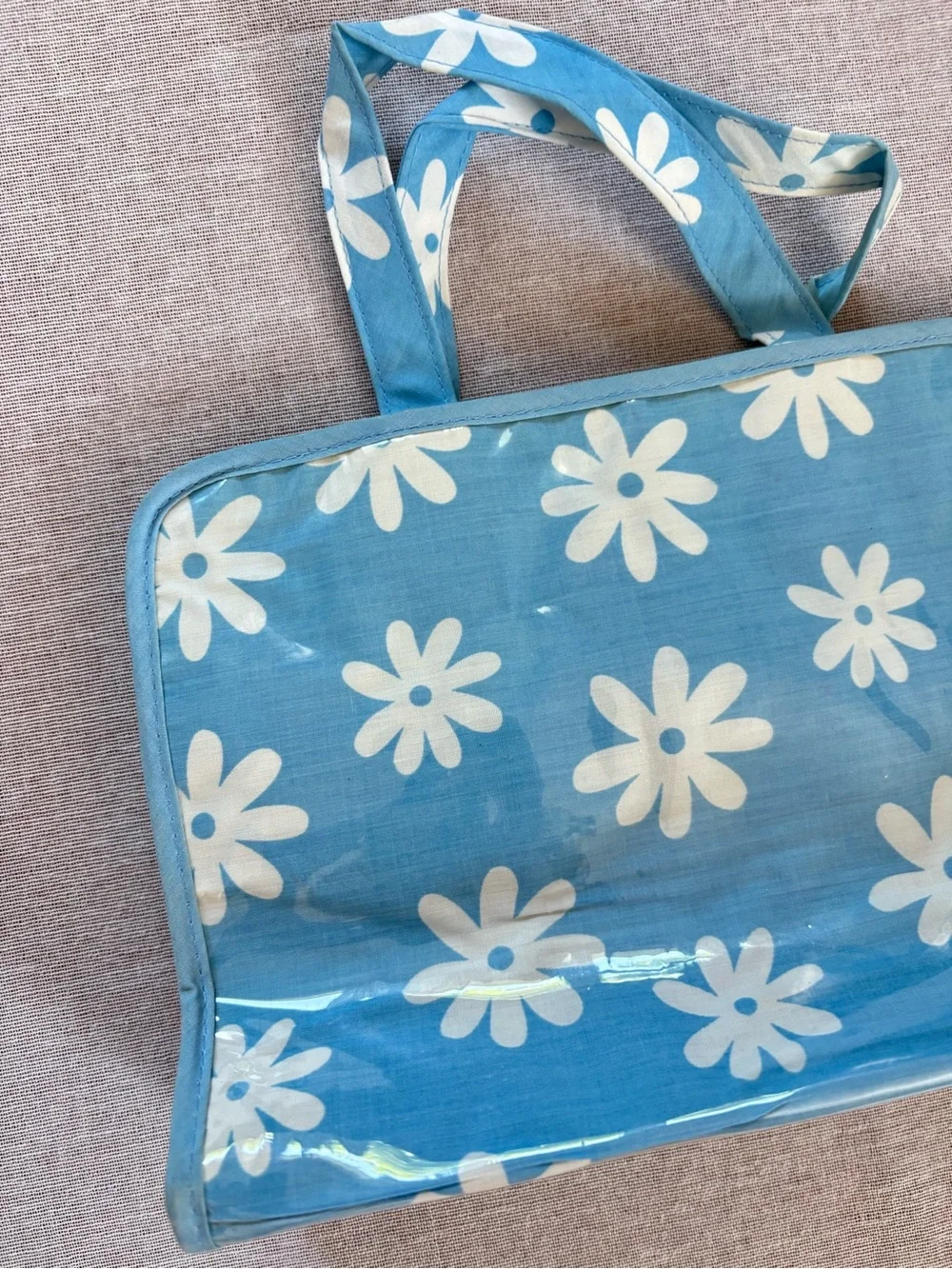 Vintage blue daisy boho vinyl clutch pouch.